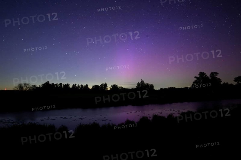 Aurora borealis aurora borealis on the Hunte dyke, Dümmerniederung nature park Park, Lower Saxony, Germany