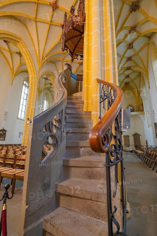 Detailed view of a stone spiral staircase leading to the pulpit with artistic carvings in a church, collegiate church, Herrenberg, Böblingen district, Germany