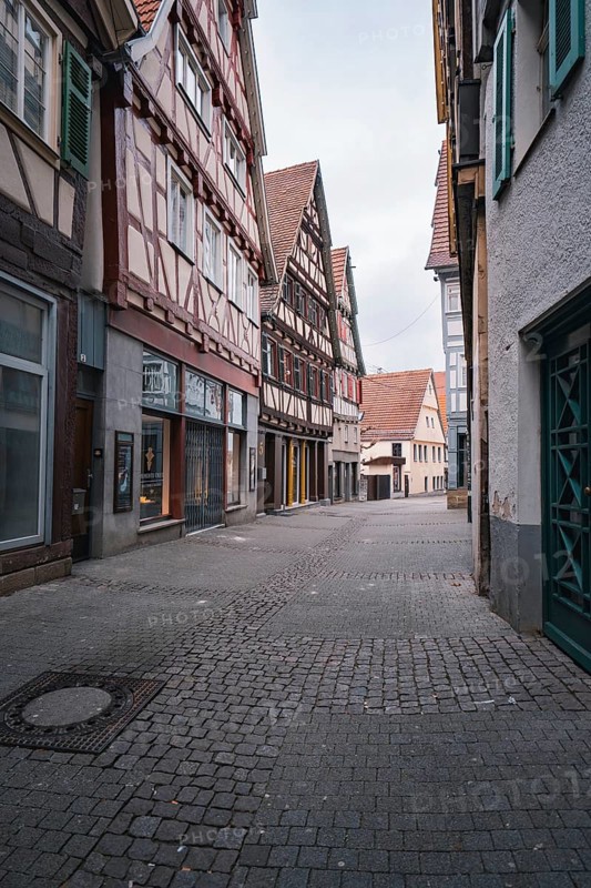 Charming old town street with half-timbered houses and small shops, Herrenberg, Böblingen district, Germany