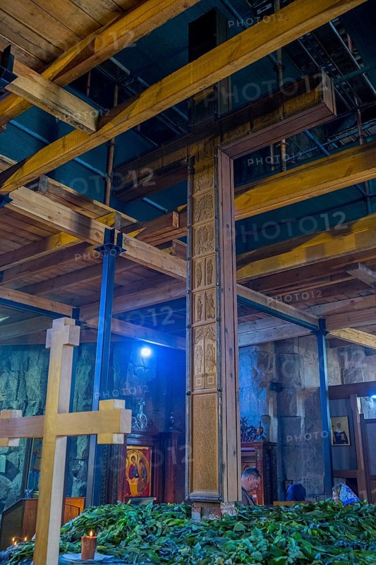 Interior with wooden cross, wooden beams and plants under artificial light, Javari Monastery, Dzhvari Church, Cross Monastery, UNESCO World Heritage Site, Mtskheta, Mtskheta, Mtskheta, Mtskheta-Mtianeti Region, Georgia