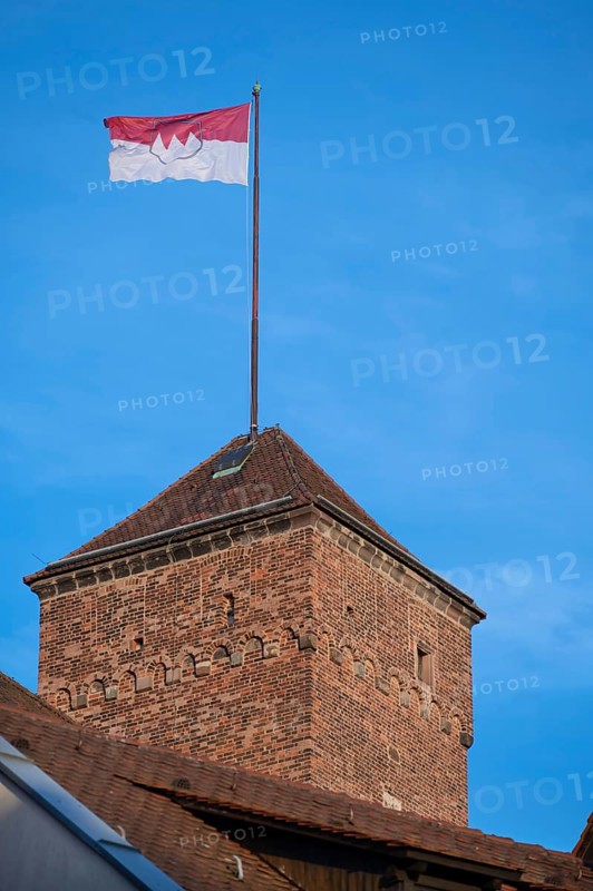 Waving Frankish flag on the Kaiserburg tower, Nuremberg, Middle Franconia, Bavaria, Germany