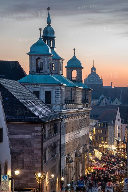 The historic Woff Town Hall, on the right the secured entrance to the Nuremberg Christmas Market in the evening, Nuremberg, Middle Franconia, Bavaria, Germany