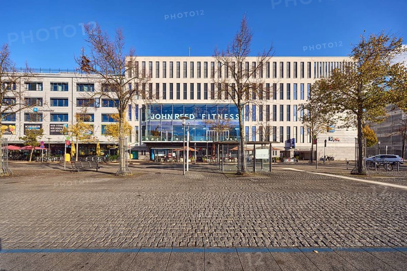 Gym, John Reed Fitness, general architecture, commercial buildings, modern architecture, bare winter trees, paving stone walkway, blue sky, cloudless, Wall street, Kiel, state capital, district-free city, Schleswig-Holstein, Germany