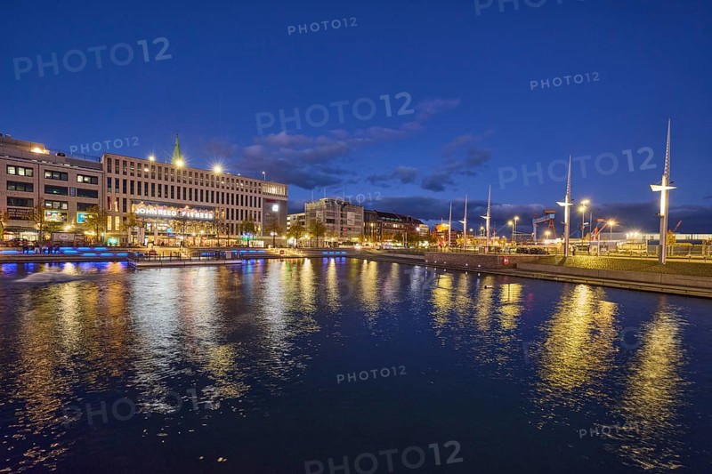 Boat harbor, triangular water area, general architecture, modern buildings, lantern, gym, John Reed Fitness, abstract reflections on the water surface, evening blue hour, deep blue evening sky, cumulus clouds, intersection wall with quay road, Kiel, state capital, district-free city, Schleswig-Holstein, Germany