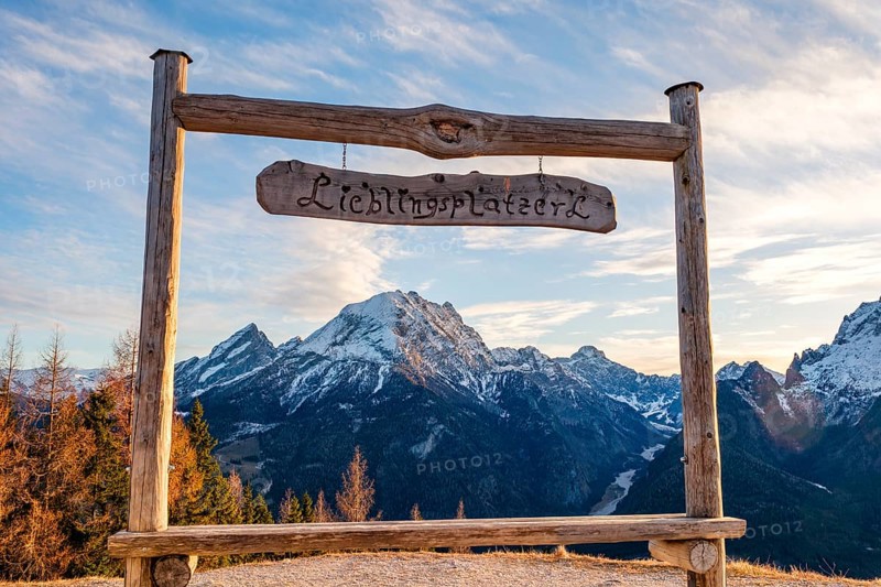 Snow-covered Watzmann through a wooden frame with the inscription Lieblingsplatzerl, Hirscheck, Ramsau, Berchtesgadener Land, Upper Bavaria, Germany