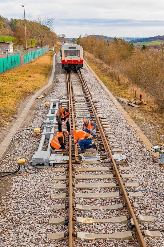 Workers carry out maintenance work on railroad tracks, historic event, first test run with a passenger train on the Hermann tracks, Hesse Railway since 1988, Calw district, Germany