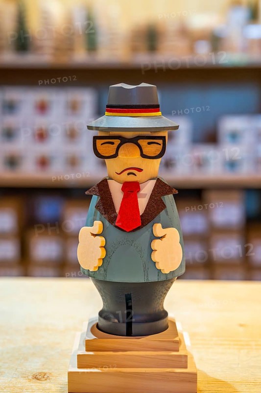 Carved wooden figure of GDR politician Erich Honecker, health resort and toy village Seiffen, Ore Mountains, Saxony, Germany