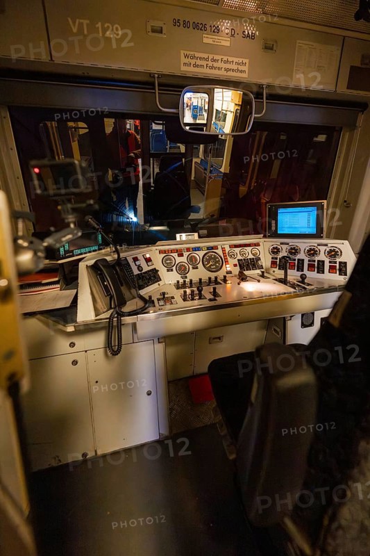 Driver's cab in the dark with illuminated control panel and technical controls, historic event, first test drive with a passenger train on the Hermann tracks, Hesse Railway since 1988, Calw district, Germany