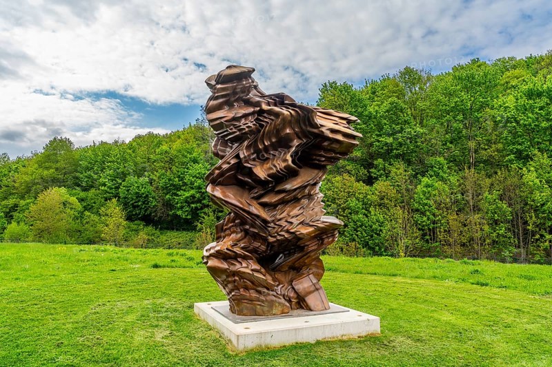 Sculpture, art installation Stack by artist Tony Cragg, Purple Path art and sculpture trail of the European Cultural Region around Chemnitz, spa garden Aue-Bad Schlema, Ore Mountains, Saxony, Germany