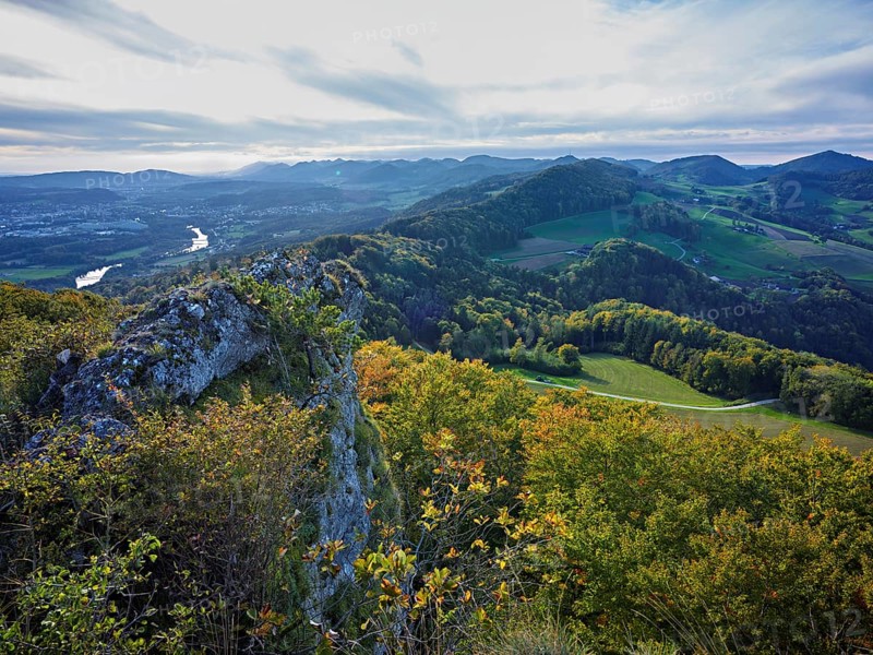 View from the Gisliflue of an autumnal forest with the Jura foothills behind, Talheim, Canton of Aargau, Switzerland