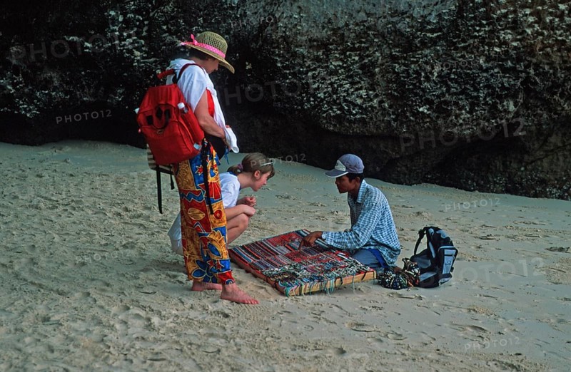 Jewelry sellers and customers on Pranang Cave beach, two years in front of the tsunami, Krabi, Thailand, December 2002, vintage, retro, old, historic