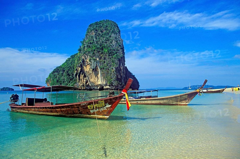 Rocks in the sea and longtail boats on Pranang Cave beach, two years in front of the tsunami, Krabi, Thailand, December 2002, vintage, retro, old, historic