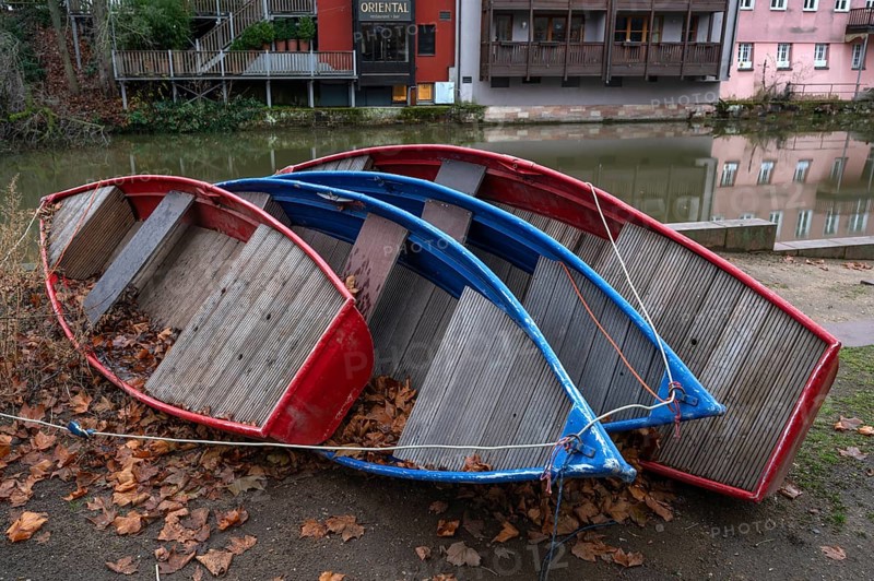 Assembled rowing boats on the banks of Pegnitz, river in Nuremberg, Middle Franconia, Bavaria, Germany