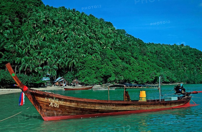 Bamboo huts, longtail boat on Ko Phi Phi Don beach, two years in front of the tsunami, Thailand, December 2002, vintage, retro, old, historic