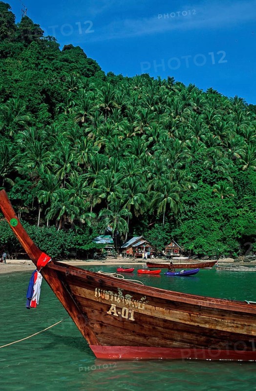 Bamboo huts, longtail boat on Ko Phi Phi Don beach, two years in front of the tsunami, Thailand, December 2002, vintage, retro, old, historic