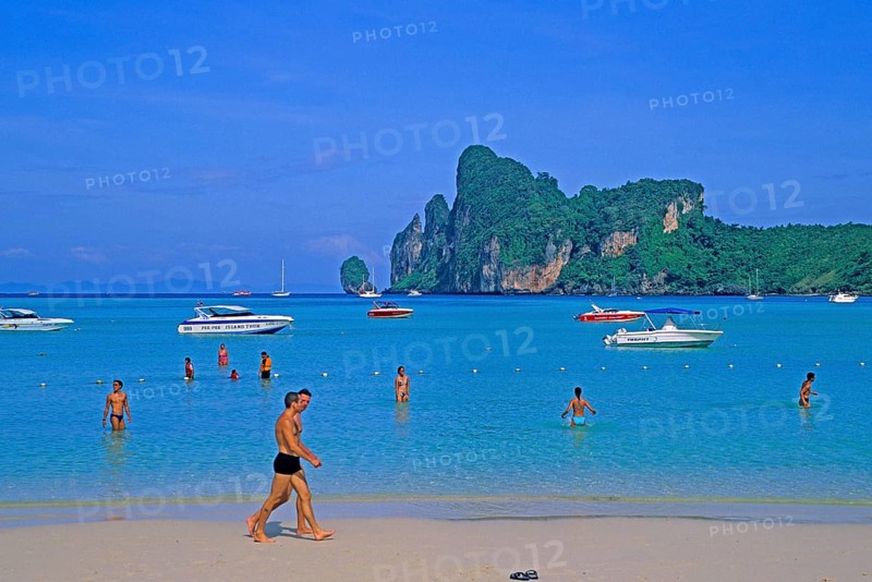 People, boats on the beach of Ko Phi Phi Don, two years in front of the tsunami, Thailand, December 2002, vintage, retro, old, historic