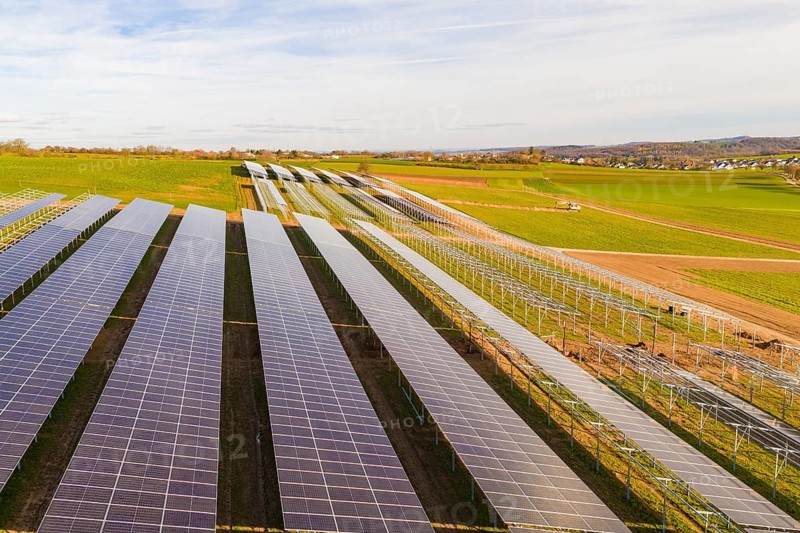 Wide solar fields spanning the hilly landscape, energy revolution, construction of PV open space, Baden-Württemberg, Germany