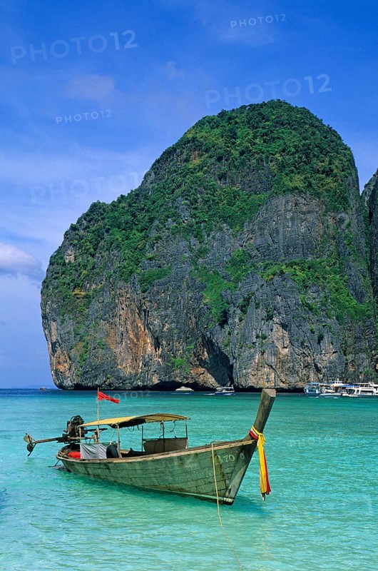 Longtail boat on Maya Bay beach, known from the movie The Beach, one year in front of the tsunami, Ko Phi Phi Le, Thailand, December 2002, vintage, retro, old, historic