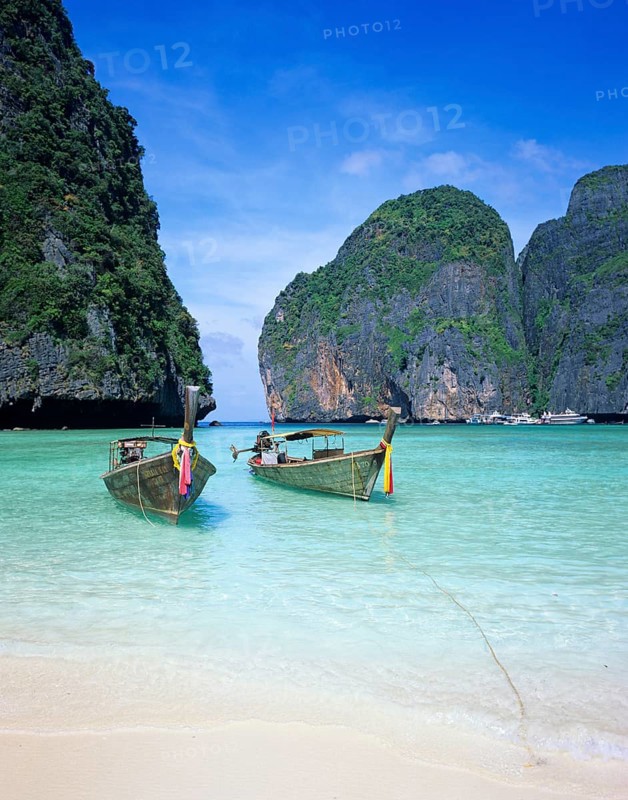 Longtail boats on Maya Bay beach, known from the movie The Beach, one year in front of the tsunami, Ko Phi Phi Le, Thailand, December 2002, vintage, retro, old, historic