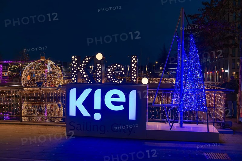 Christmas decoration in Kiel am Holstenfleet, Kleiner Kiel Canal, city center, Christmas, lighting, lights, sailboats, stars, lettering, tree ball, water reflection, evening, darkness, Germany