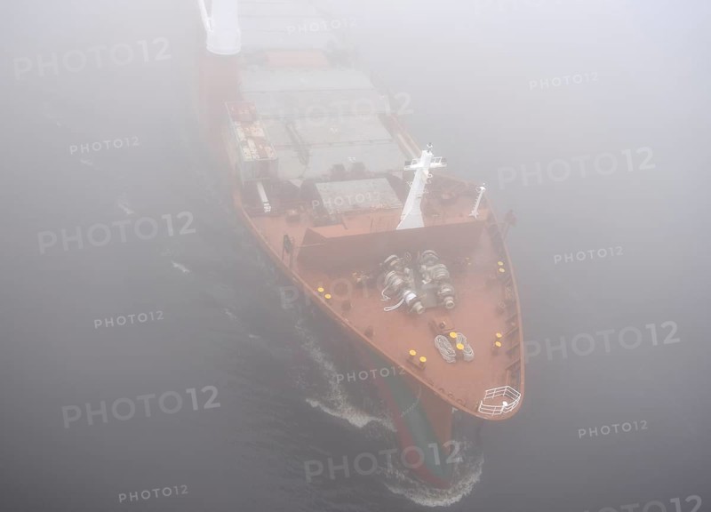 Freighter STADIONGRACHT in fog in the Kiel Canal, NOK, Kielkanal, Kielcanal, Schleswig-Holstein, Germany