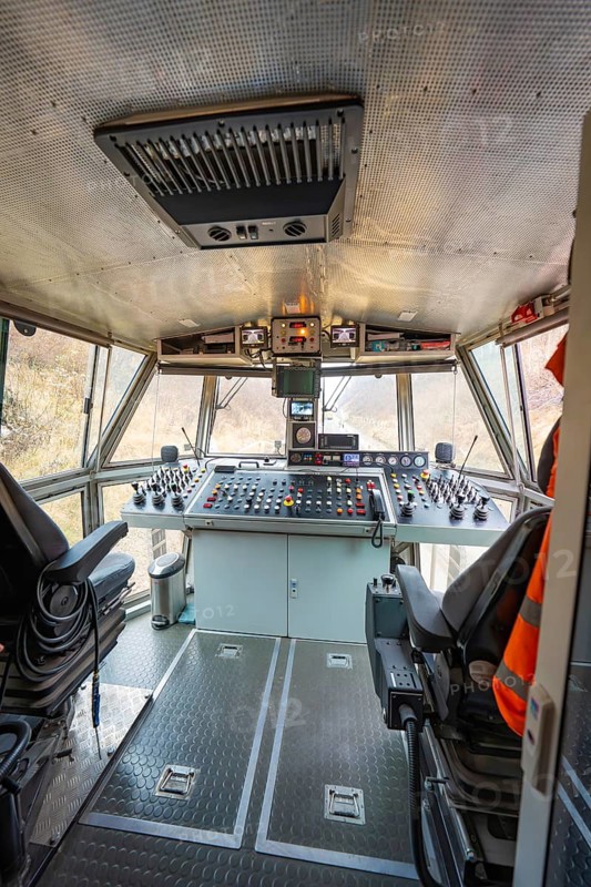Spacious train driver's cab with comprehensive control panel and seating, stuffing machine on Hermann, Hesse, Bahn, Althengstett, Calw district, Germany