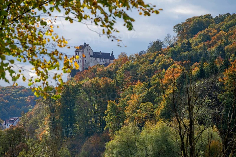 Egloffstein Castle with mixed autumn forest, Egloffstein, Upper Franconia, Bavaria, Germany