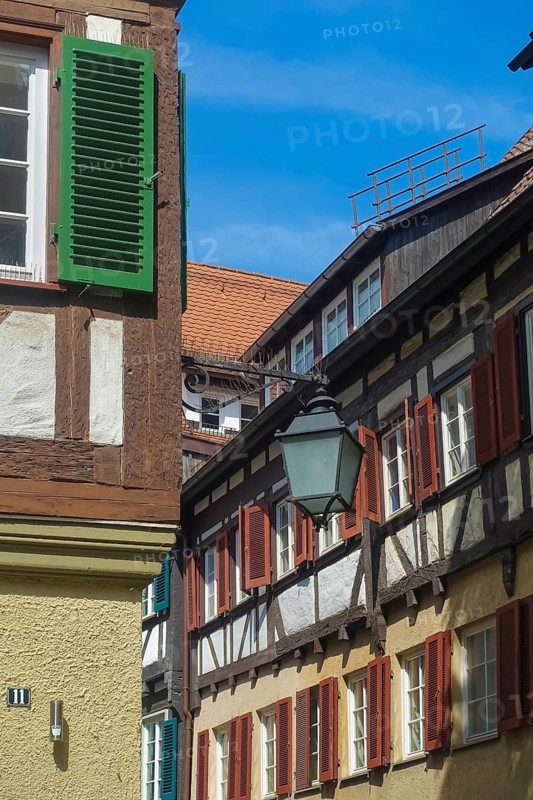 Typical old town scene, half-timbered houses, old street lamp, light, shutters, idyll, Tübingen, Baden-Württemberg, Germany