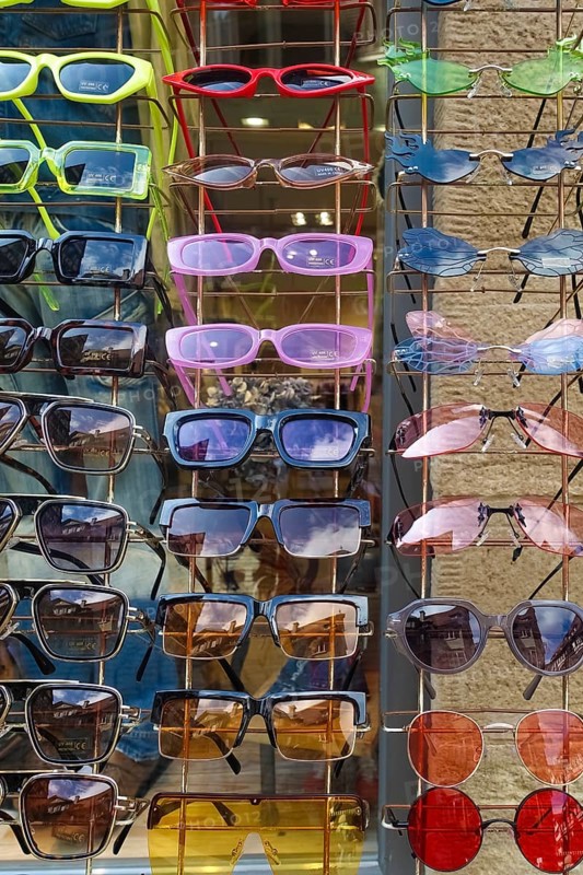 Colorful sunglasses, range of products, eyeglass holder, eyeglass stand, funny shapes, Tübingen, Baden-Württemberg, Germany
