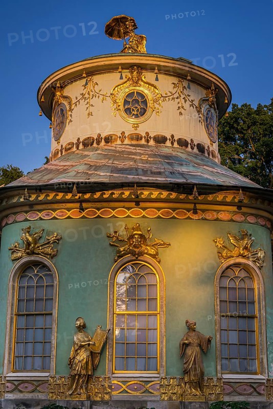 Chinese house in the evening light, tea house with golden sculptures, Sanssouci Park, Potsdam