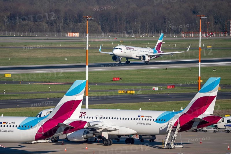 Eurowings aircraft, on field positions and on landing, Düsseldorf airport, DUS