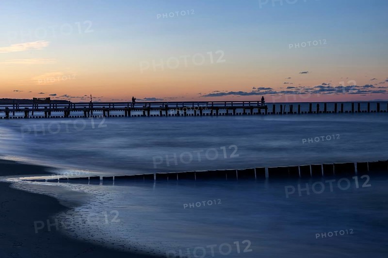 Groves and wooden walkway in the sea, sunset, long exposure, Zingst, Fischland-Darß-Zingst, Western Pomerania Lagoon Area National Park, Mecklenburg-Western Pomerania, Germany
