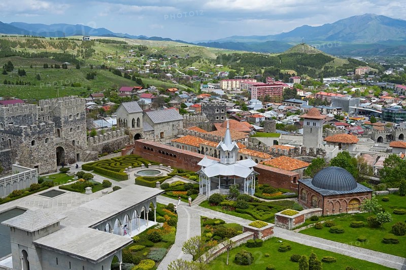 View of a castle with gardens surrounded by an urban landscape and hills in the background, Rabati Fortress, Akhaltsikhe, Samtskhe-Javakheti region, Samtskhe-Javakheti, Georgia