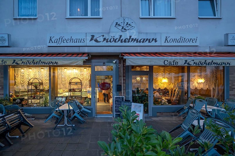 Nostalgic café lit in the evening, opened in 1968, Röthenbach near Schweinau district, Nuremberg, Middle Franconia, Bavaria, Germany