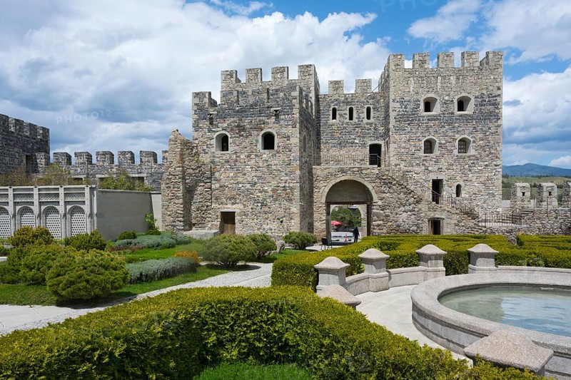 Historic stone fortress with round tower, well-kept garden and round fountain, Rabati fortress, Akhaltsikhe, Samtskhe-Javakheti region, Samtskhe-Javakheti, Georgia