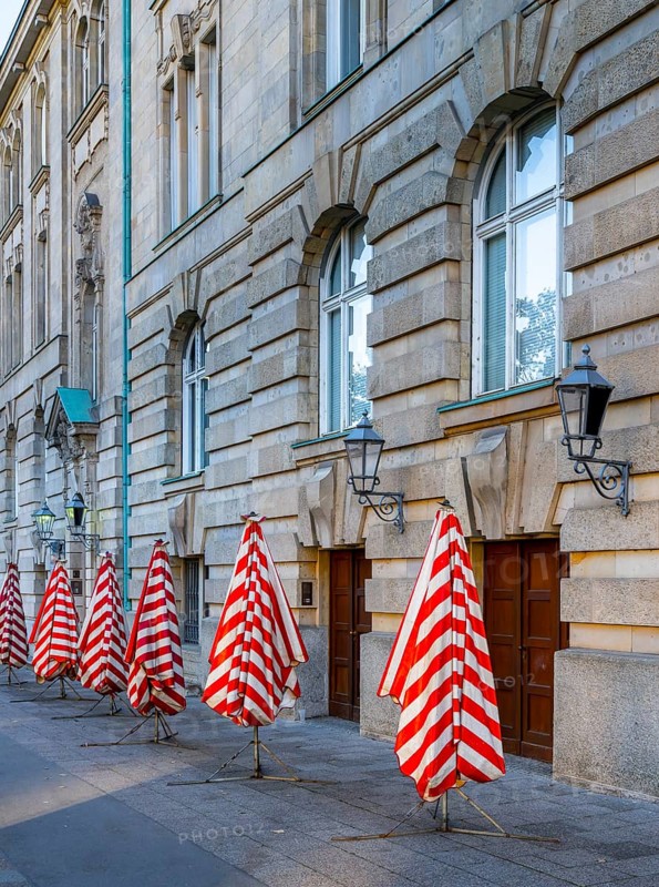 Red and white striped parasols on the back of the Deutsches Museum, Berlin, Germany