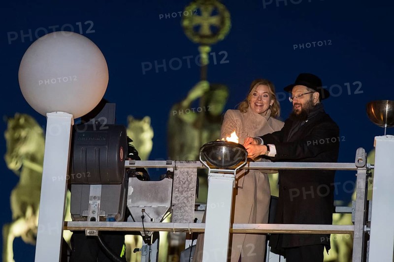 Julia Klöckner (President of the German Bundestag) and Rabbi Yehuda Teichtal (Rabbi of the Chabad-Lubavitch movement) at the lighting of lights to mark 20 years of Hanukkah in front of the Brandenburg Tor, Berlin, 17 December 2025