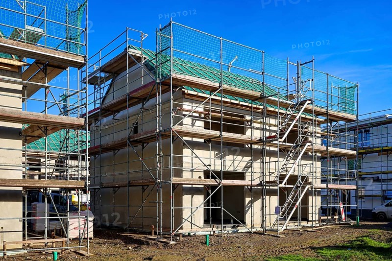 Castrop-Rauxel, North Rhine-Westphalia, Germany - residential construction in the Ruhr area. New construction district with semi-detached and terraced houses in the energy-saving KfW efficiency house standard 55