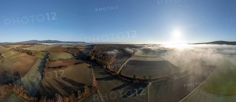 Aerial view of fog over fields and forest, St.Veit, Berndorf, Lower Austria, Austria