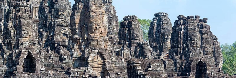 Panoramic picture of huge stone-carved faces of Bodhisattva Lokeshvara, also Avalokiteshvara, Bayon Temple, Angkor Thom, UNESCO World Heritage Site, Angkor Wat, Siem Reap, Cambodia