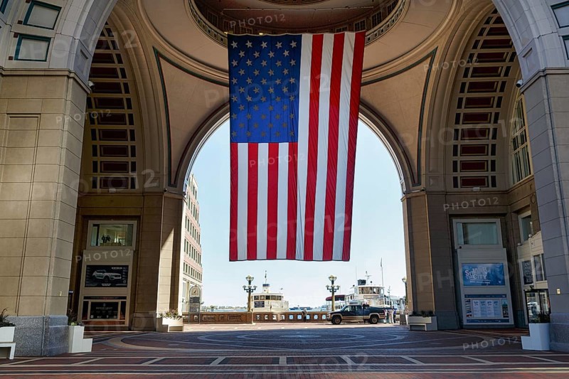 American flag fluttering, distinctive archway, Boston Harbor Hotel, Rowes Wharf, Freedom Trail, Financial District, Downtown, Boston, Massachusetts, New England, USA