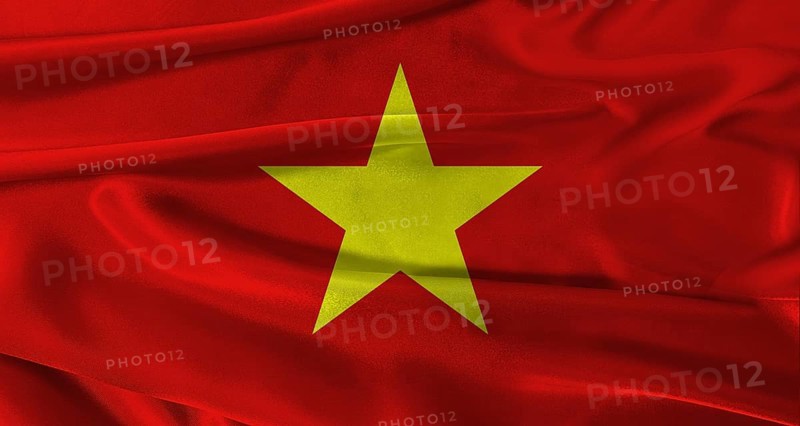 Flag of Vietnam with fabric textured background. Close up of National flag of Vietnam with realistic texture