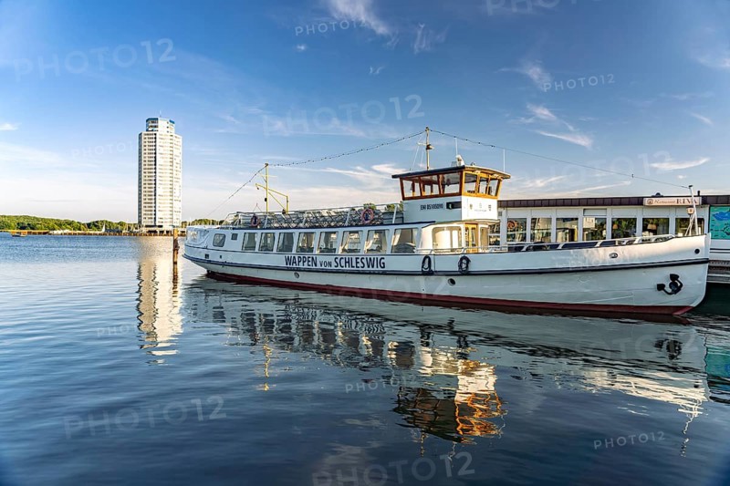 Excursion ship Wappen von Schleswig and the Viking Tower on the Schlei, City of Schleswig, Schleswig-Holstein, Germany