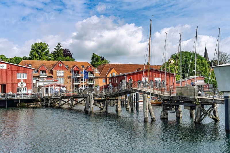Eckernförde wooden bridge and the Siegfried shipyard at the inland port in Eckernförde, Schleswig-Holstein, Germany