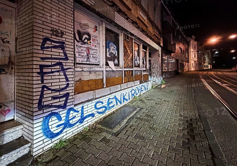 Decaying façade smeared with graffiti, scrap property in Gelsenkirchen, one of the poorest cities in Germany, Ruhr area, North Rhine-Westphalia