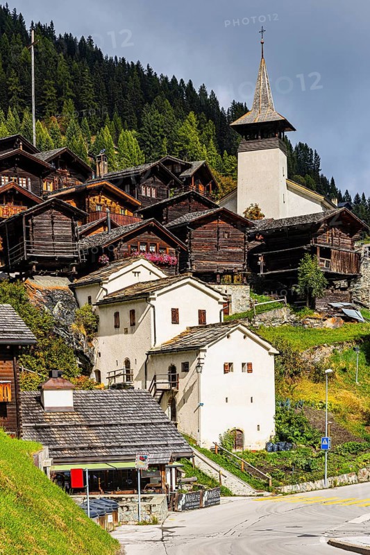 White cellars, historic farmhouses, Saint Theodule church, Grimentz, Val d'Anniviers, Valais Alps, Canton of Valais, Switzerland