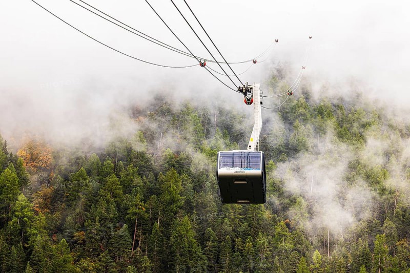 Gondola and cable car line in fog, cable car from Grimentz to the Espace Weisshorn summit station, Val d'Anniviers, Valais Alps, Canton of Valais, Switzerland