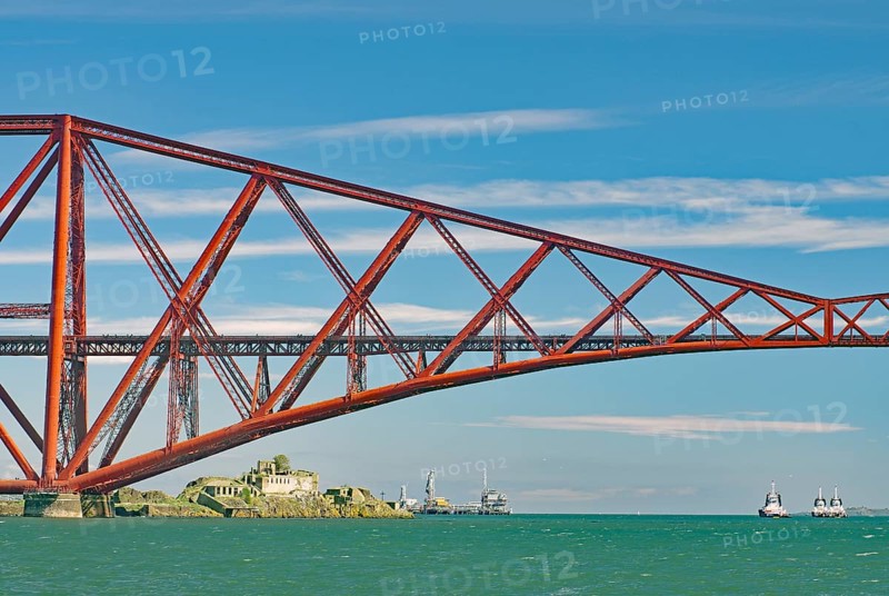 A section of a red bridge over a lake with passing boats, railway bridge, Firth of Forth, Edinburgh, Scotland, Great Britain