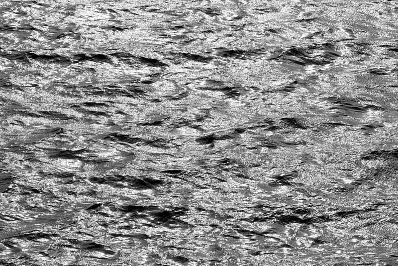 Water surface with waves and light reflections, black and white, Möhnesee, Möhnetalsperre, North Rhine-Westphalia, Germany