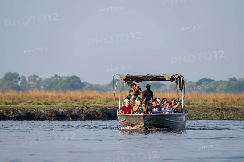 Tourist safari boat in Chobe River, Chobe Waterfront, Ihaha, Chobe National Park, Botswana